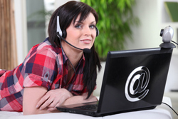 Woman chatting on headset microphone